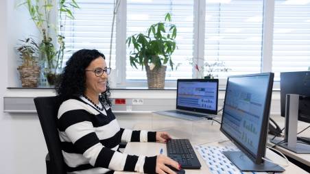 Woman sitting at her desk